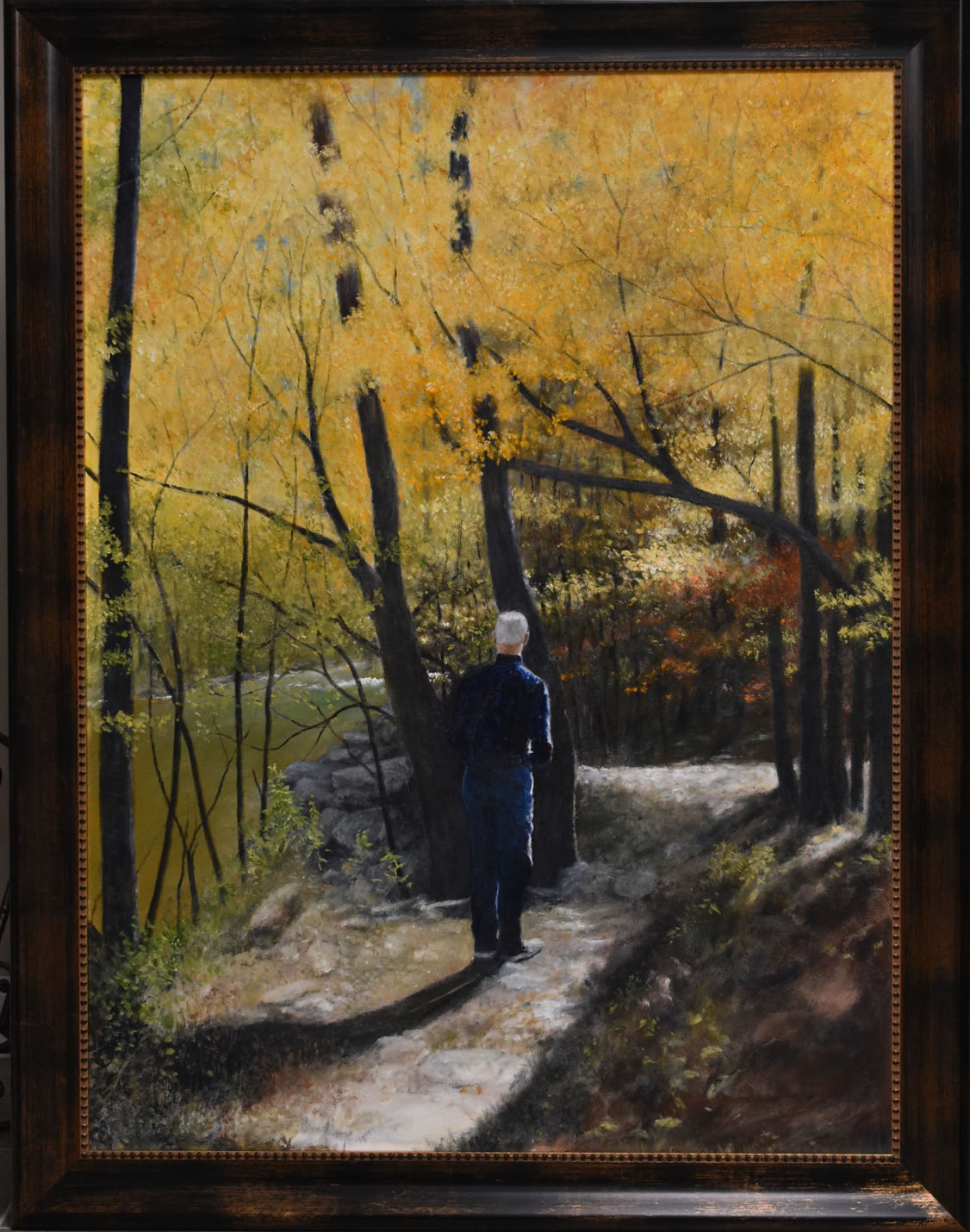 Man pausing in the autumn forest to listen to God